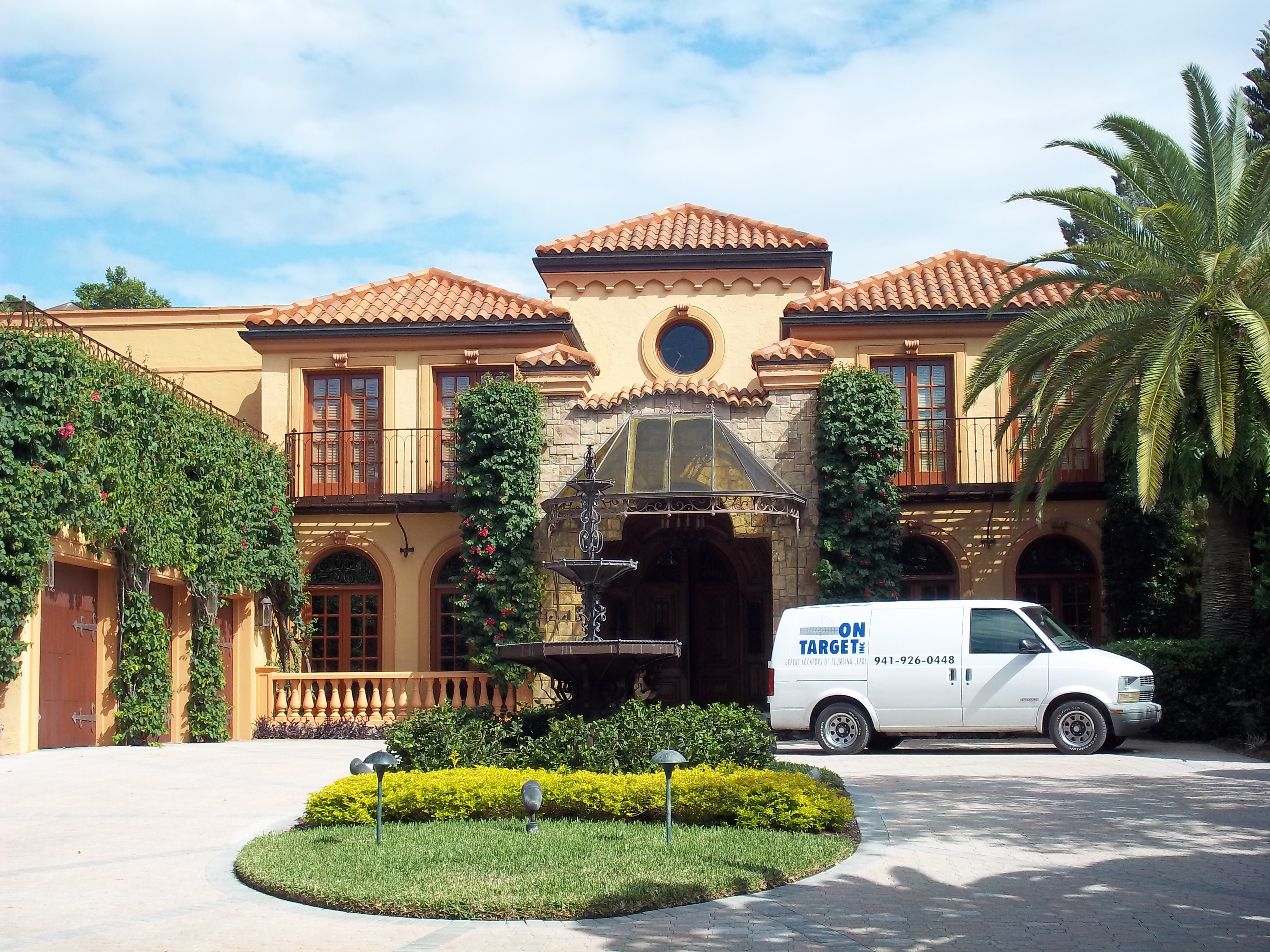 Omni Eye Inc van on residential job site